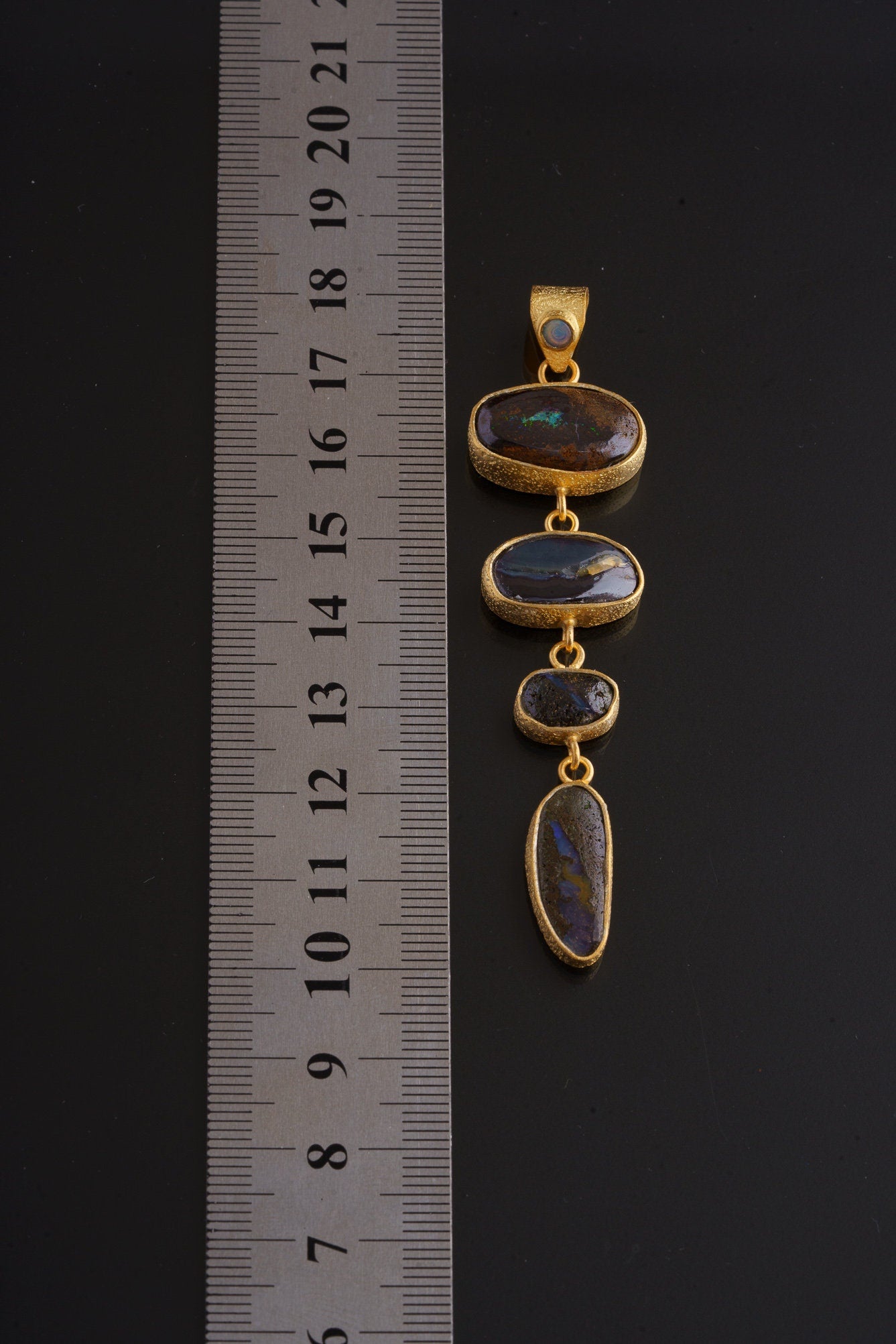 Dangling Necklace Featuring Four Australian Boulder Opals Crowned with Gemmy Black Opal, Sand Textured Gold-Plated Sterling Silver Pendant