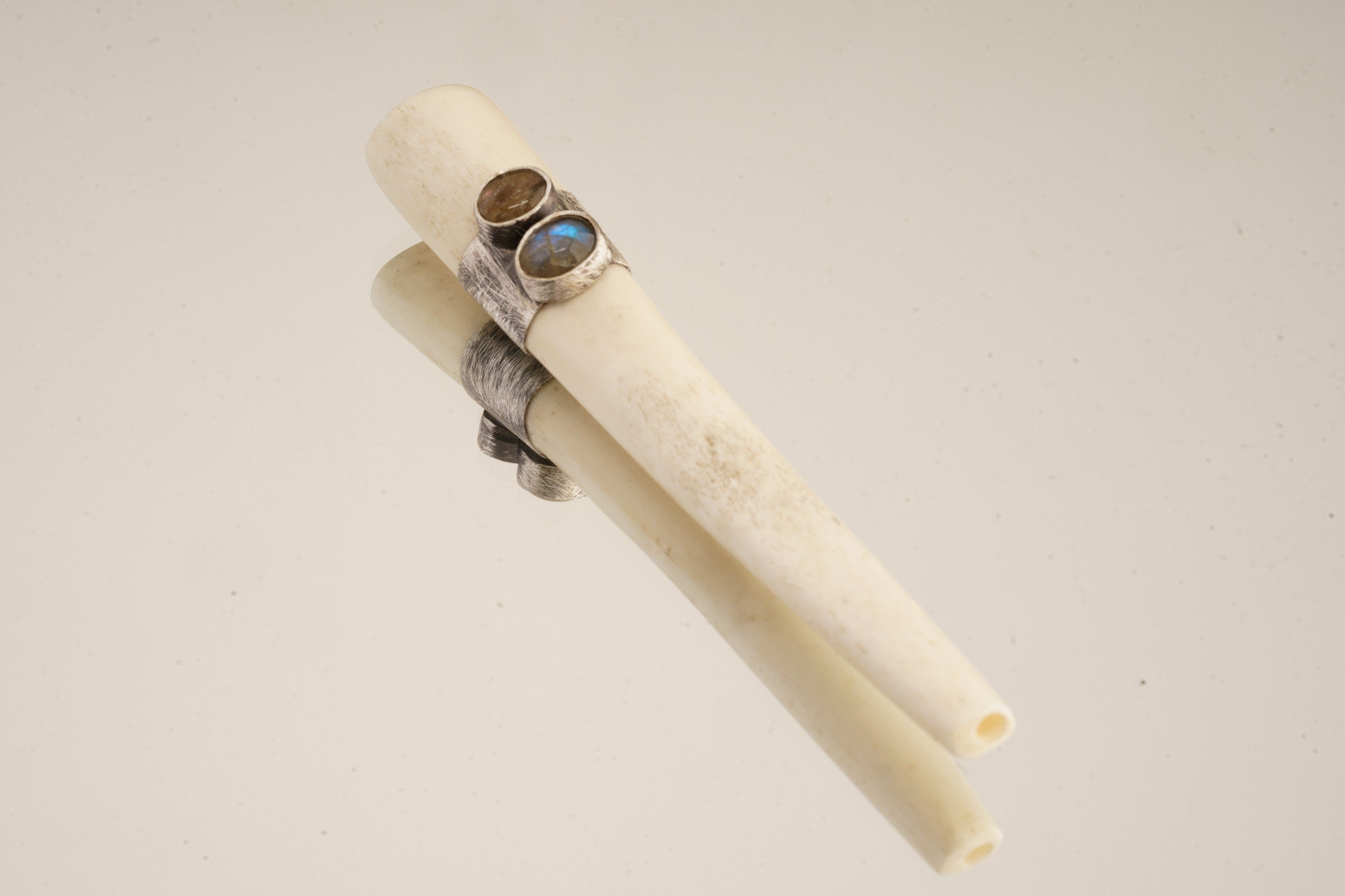 The Mystic's Breath: One Blue and One Red Oval Labradorite - Antique Bone Inhalation Tube