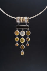 Carved Bone, Black Tourmaline, Mexican Amber, and Rainbow Labradorite Pendant, Sterling Silver,