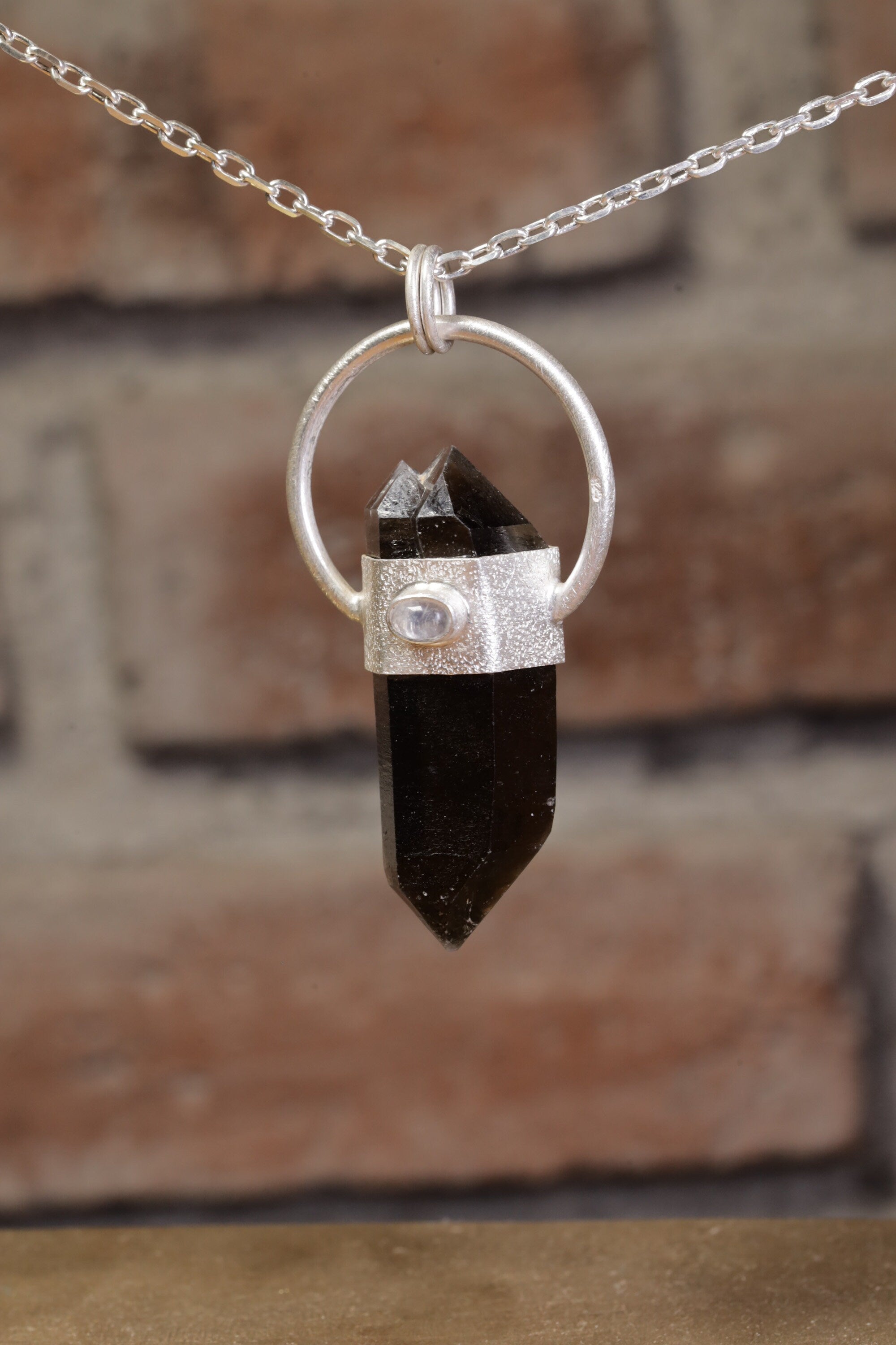 Smokey Luminescence: Sterling Silver Sand-Textured Crystal Pendant with Double Terminated Smoky Cathedral Quartz from Glen Innes & Moonstone