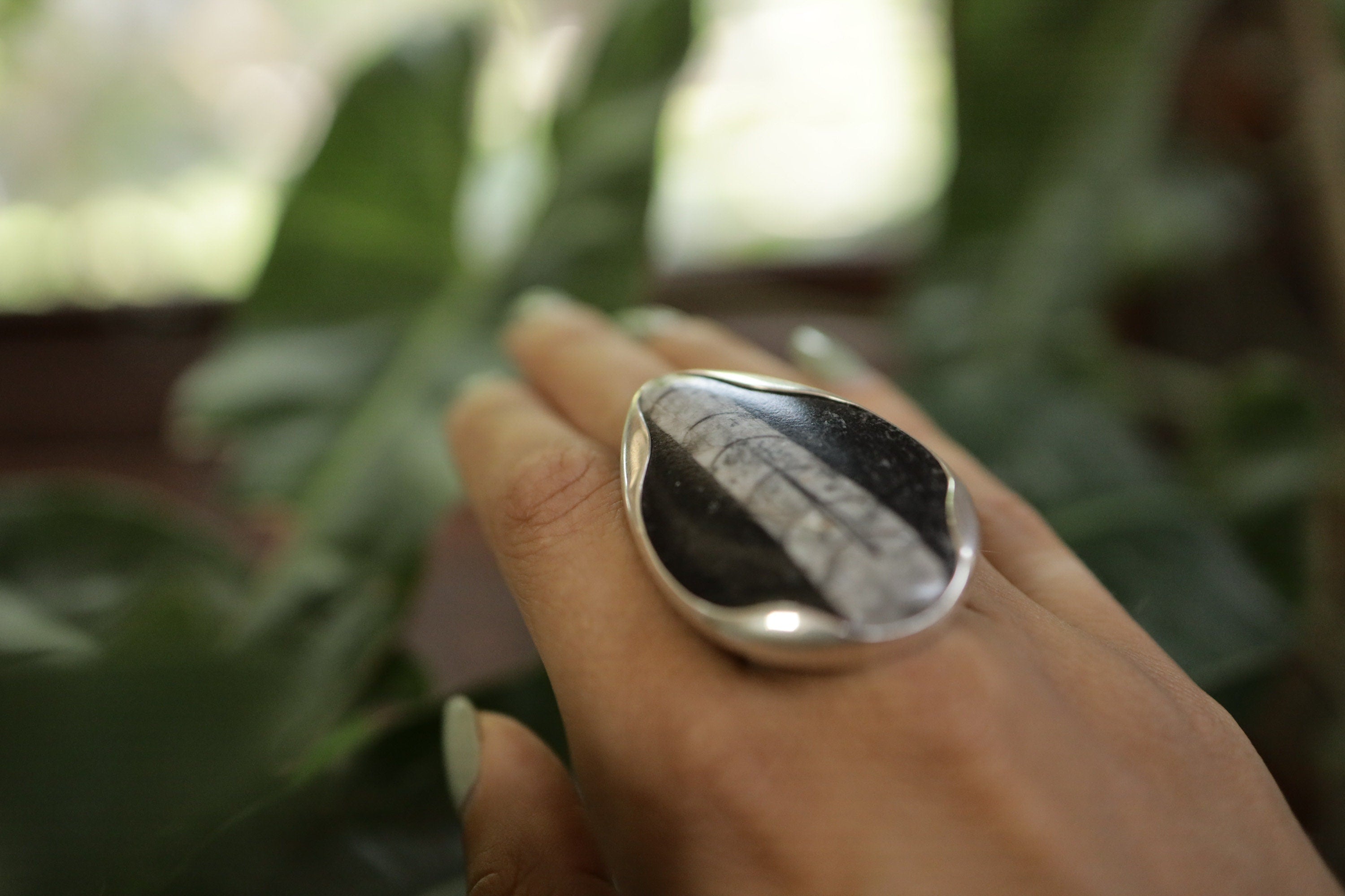 A Sturdy Embrace of Ancient Mysteries and Modern Craft: Adjustable Sterling Silver Ring with Fossil - Unisex - Size 5-10 US