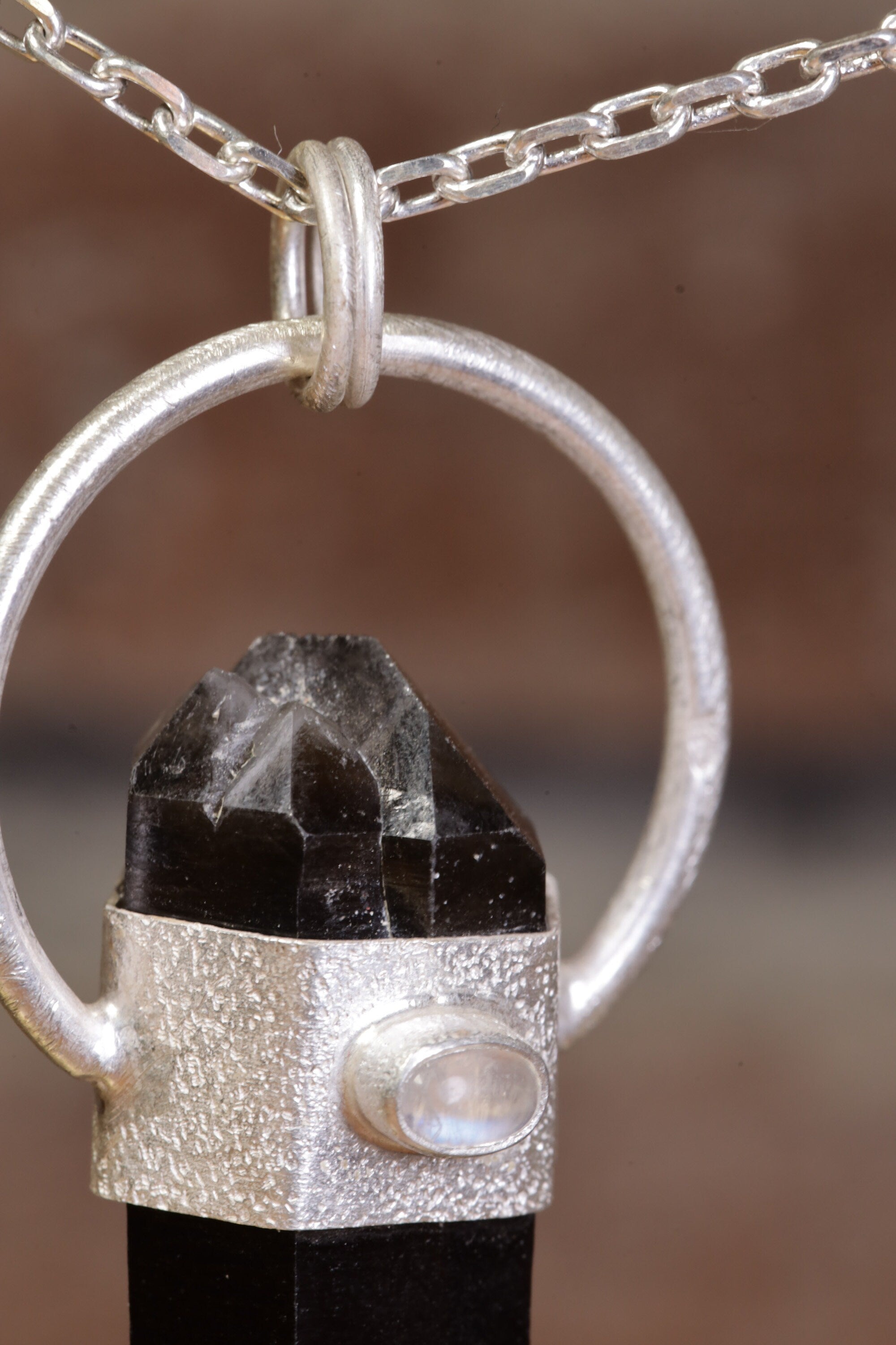 Smokey Luminescence: Sterling Silver Sand-Textured Crystal Pendant with Double Terminated Smoky Cathedral Quartz from Glen Innes & Moonstone