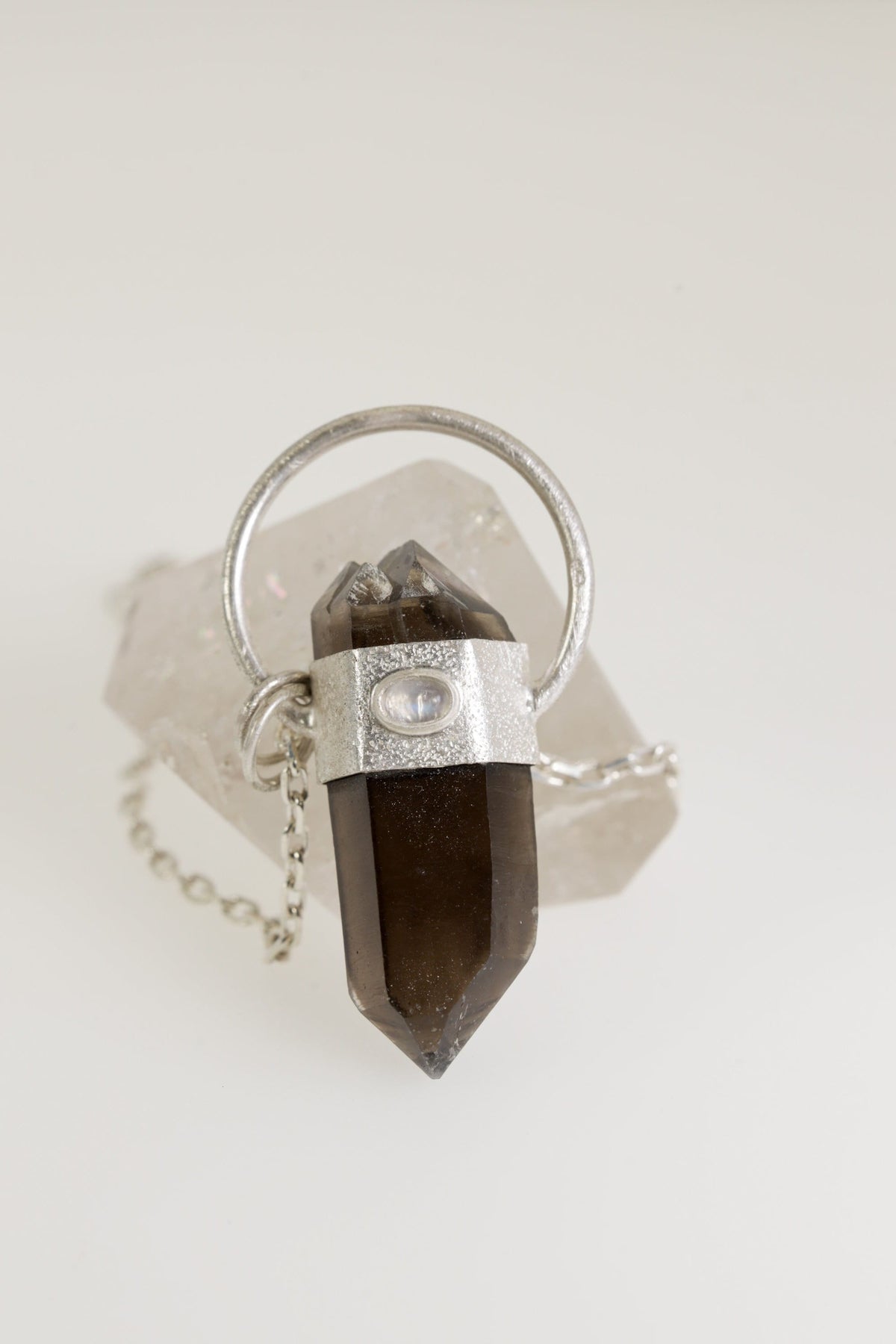 Smokey Luminescence: Sterling Silver Sand-Textured Crystal Pendant with Double Terminated Smoky Cathedral Quartz from Glen Innes & Moonstone