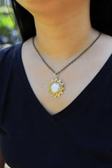 Lustrous Sunburst Pendant: Mother-of-Pearl Stone - Gold-toned Brass Pendant - Emotional Balance and Tranquillity