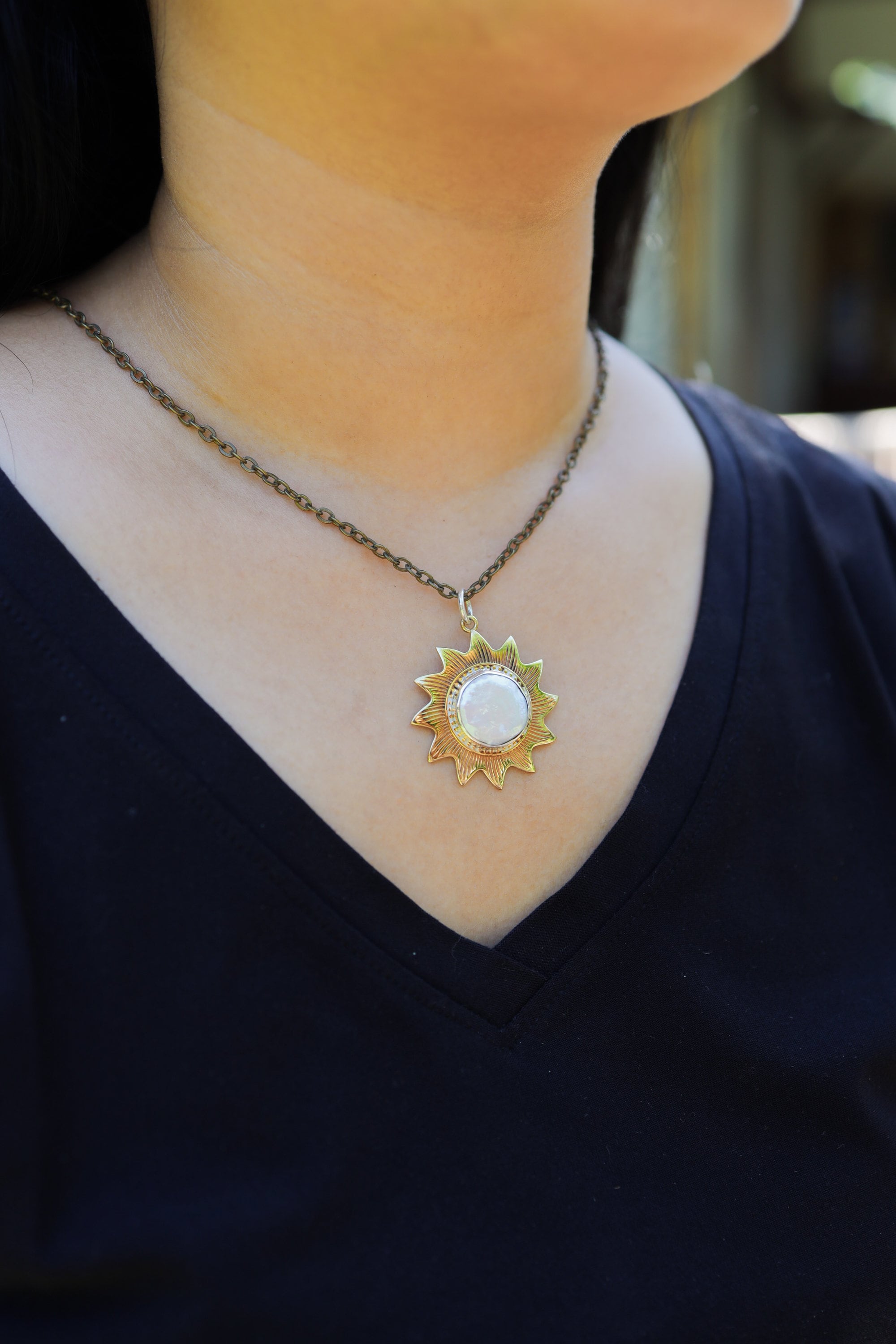 Lustrous Sunburst Pendant: Mother-of-Pearl Stone - Gold-toned Brass Pendant - Emotional Balance and Tranquillity